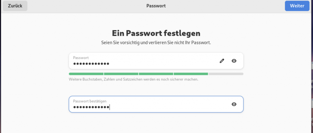 Screenshot: Einrichtungsassistent mit zwei Textfeldern für die Vergabe eines Passworts, ein grüner Balken zwischen den Textfeldern zeigt die Stärke des eingesetzten Passworts an.