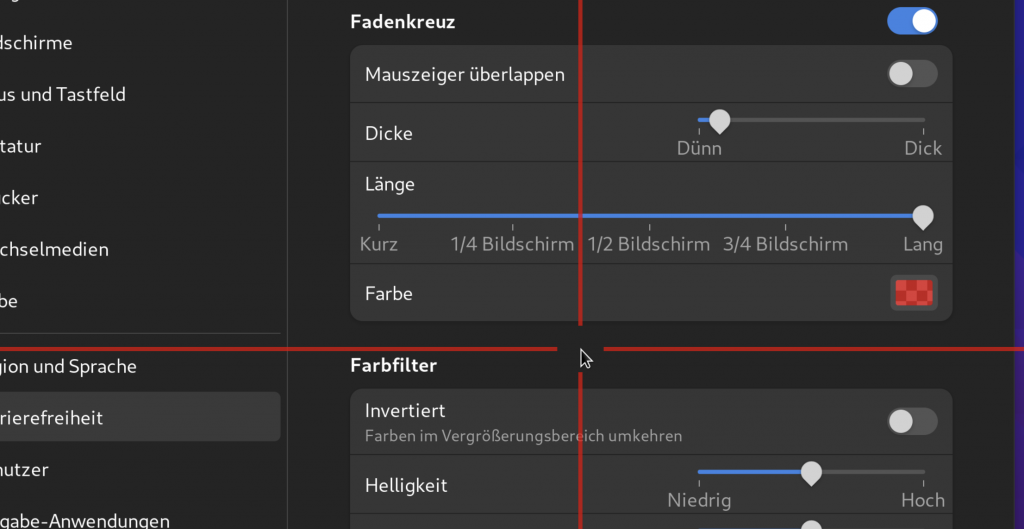 Screenshot: Fedora Barrierefreiheit, zugeschaltetes Fadenkreuz mit roten Linien.