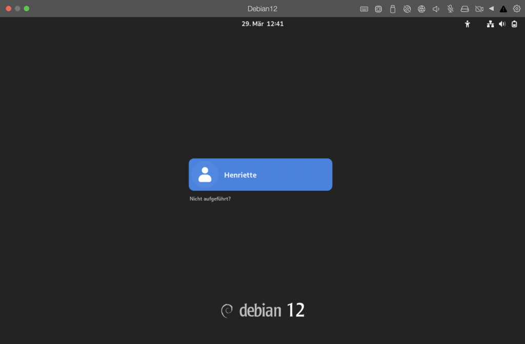 Debian 12 Login Bildschirm, in der Mitte ein blaues Feld mit dem Benutzernamen.