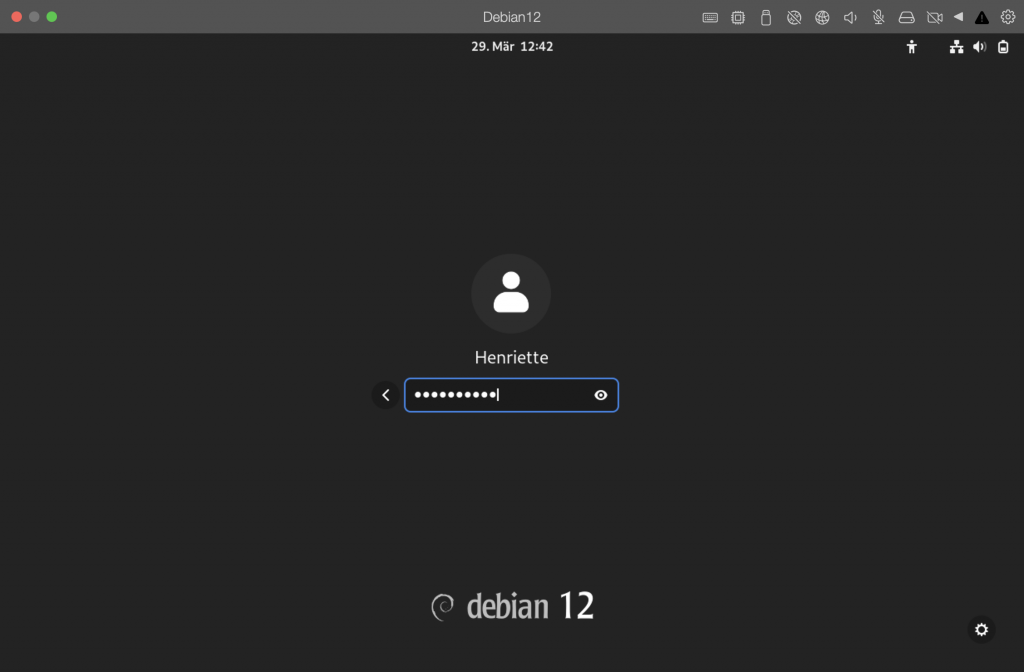 Debian 12, Login Bildschirm mit Passwort- Eingabefeld in der Mitte. Für die Buchstaben des eingegebenen Passworts werden Punkte angezeigt